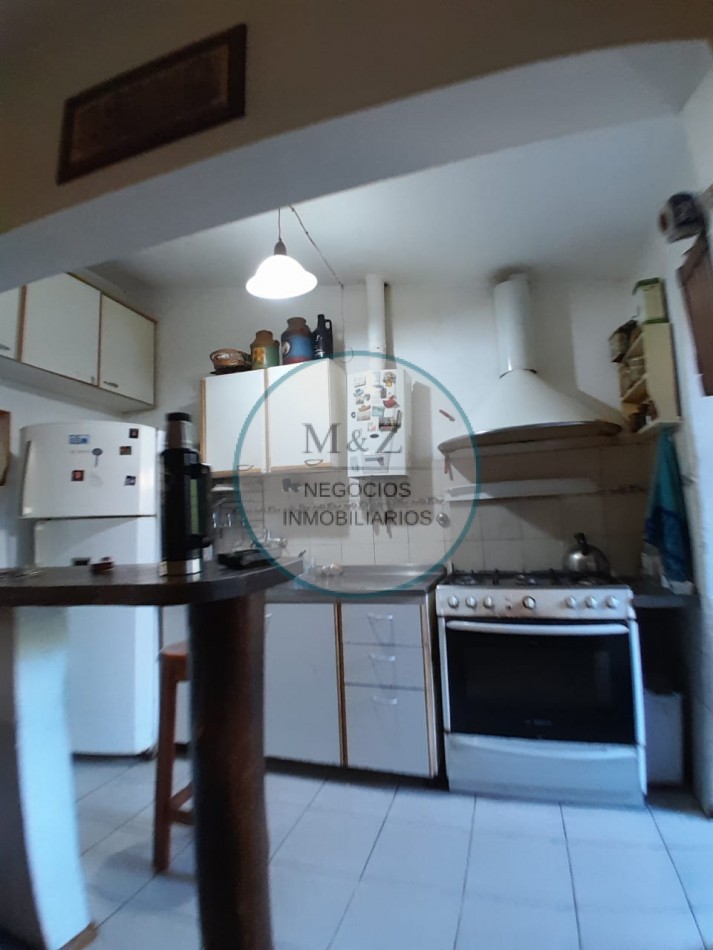 VENDE CASA CON QUINCHO 