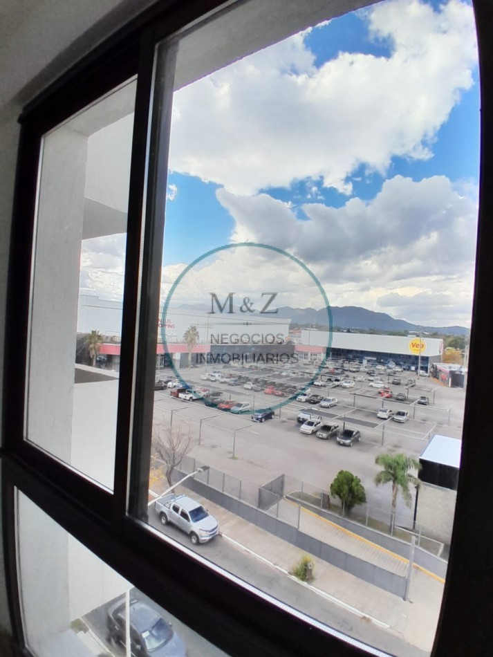 VENDE DEPARTAMENTO FRENTE AL SHOPING