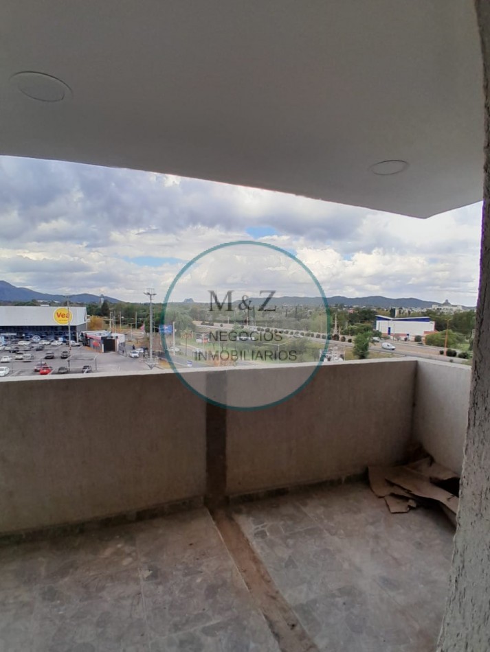 VENDE DEPARTAMENTO FRENTE AL SHOPING