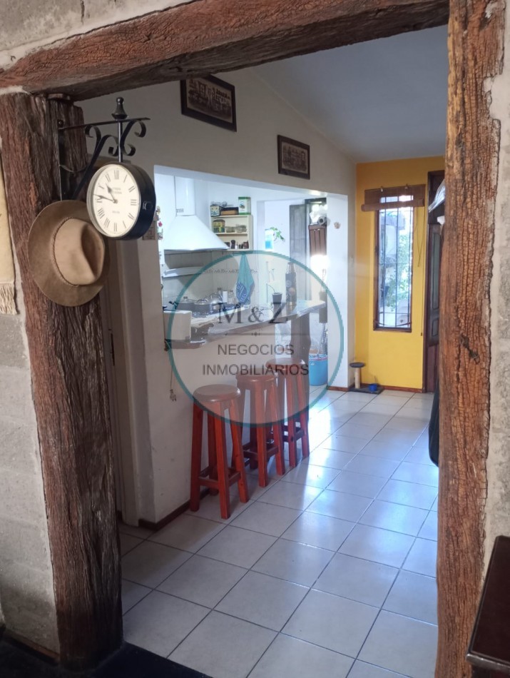 VENDE CASA CON QUINCHO 