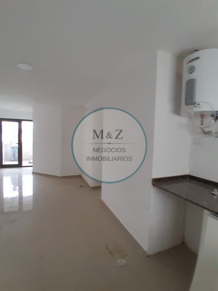 VENDE DEPARTAMENTO FRENTE AL SHOPING